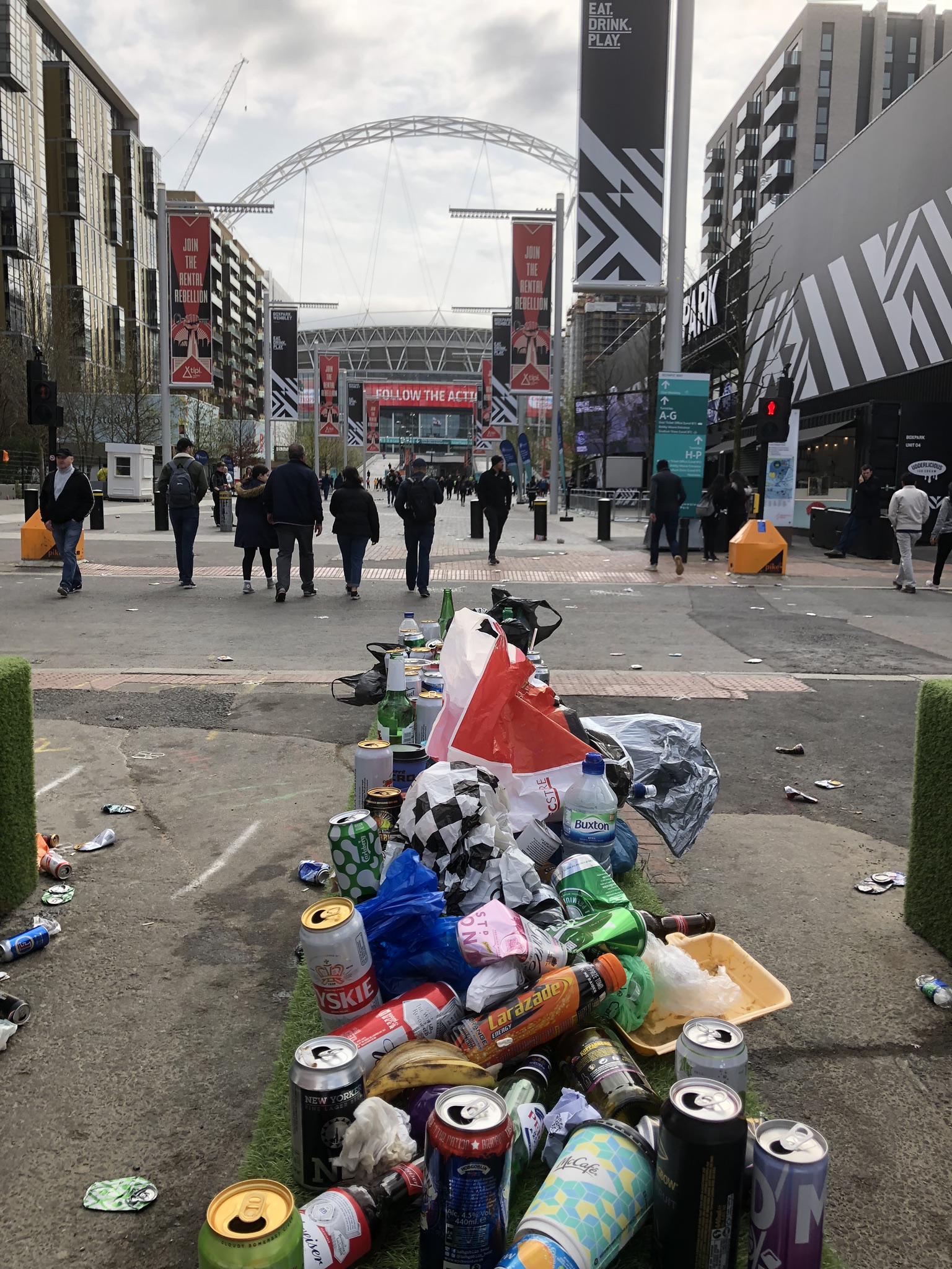 Wembley Stadium with litter all around it 
